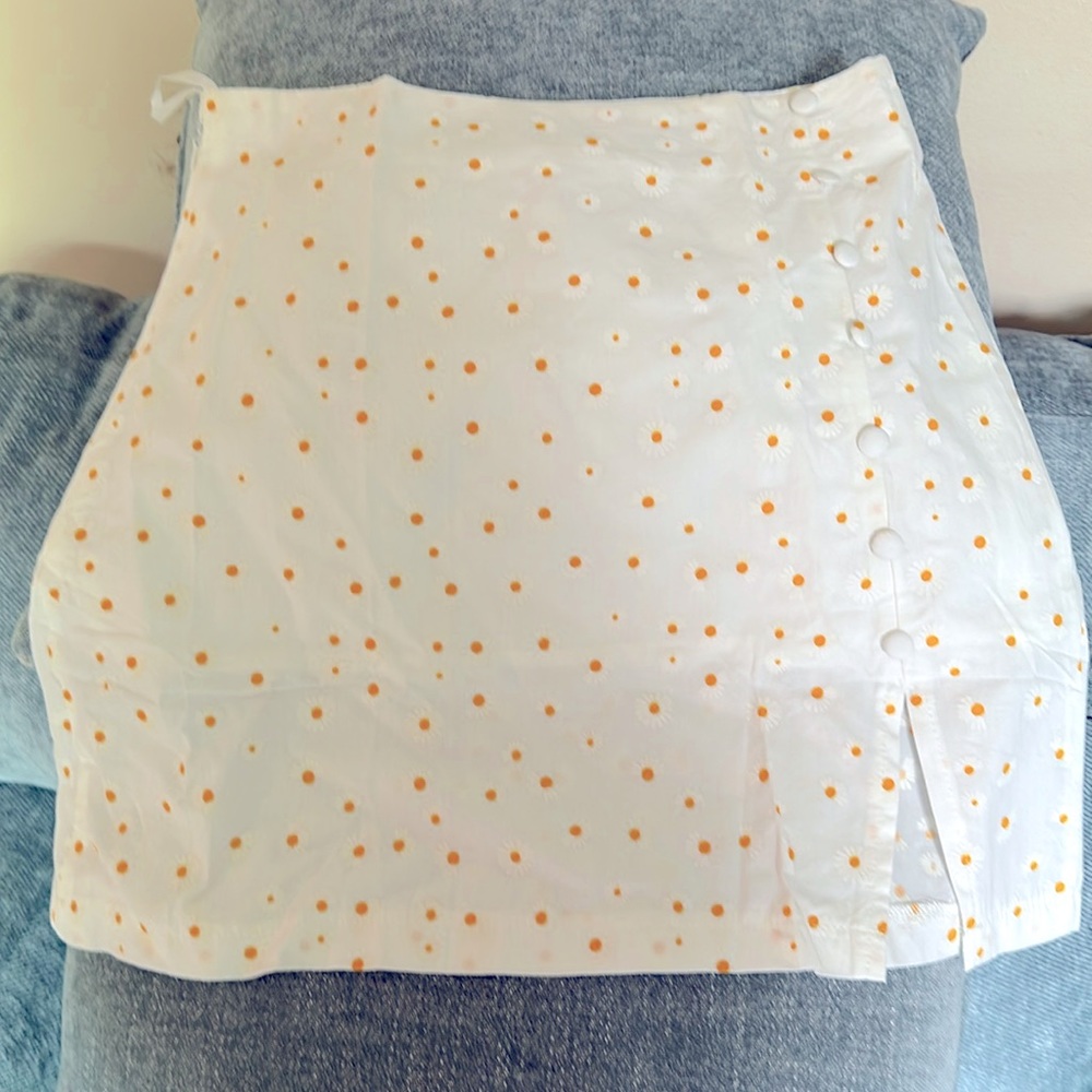 Brand New- never worn small side slit, zipper on side, buttoned side skirt